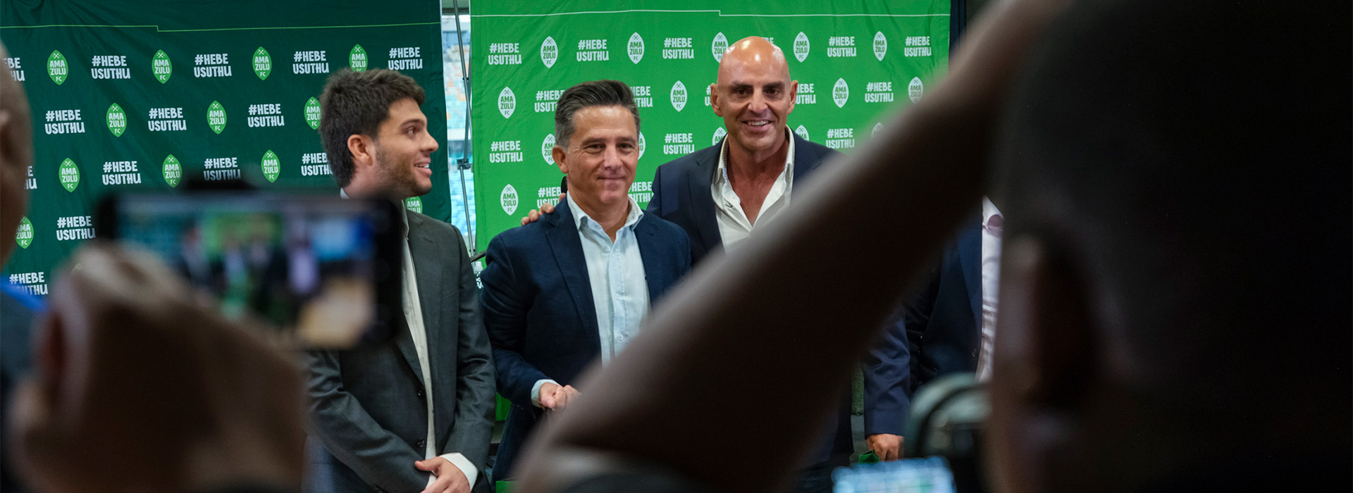 Representatives from Levante UD and ISAM360 pose for photographs during the partnership announcement at AmaZulu FC.